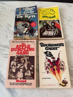 LOT OF 4 DISNEY VINTAGE BOOKS 'HERBIE' DR. SYN BLACKBEARD APPLE DUMPLING PULP